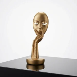 Golden Face Mask Sculpture